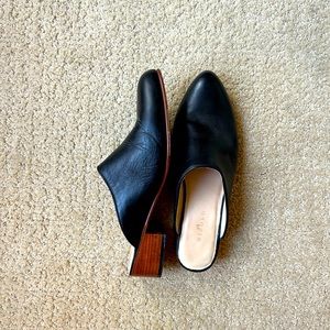Black Nisolo Mules, size 8.5.